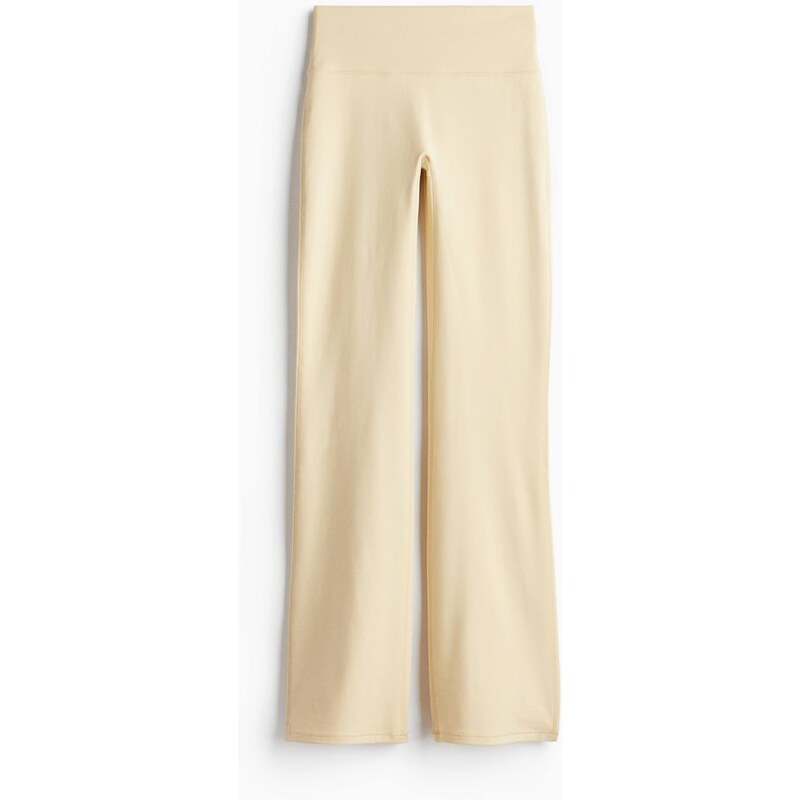 H&M - Sportovní legíny Flared SoftMove - Pannacottově Žlutá
