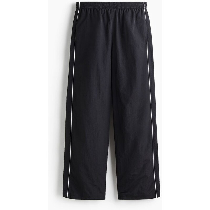 H&M - Nylonové sportovní kalhoty Relaxed Fit - Černá