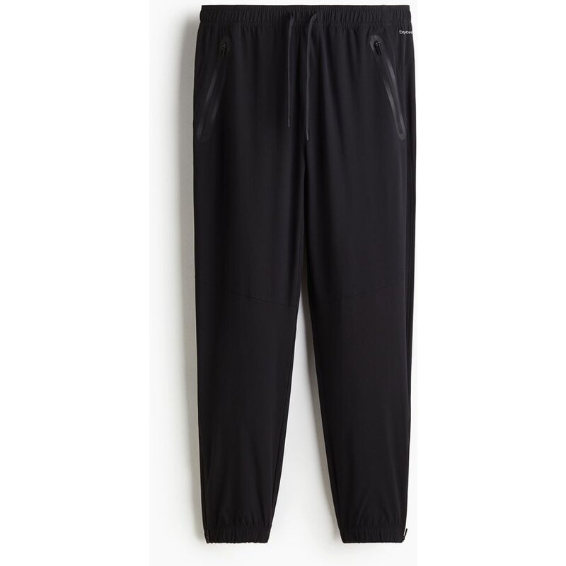 H&M - Sportovní kalhoty jogger Regular Fit DryMove - Černá