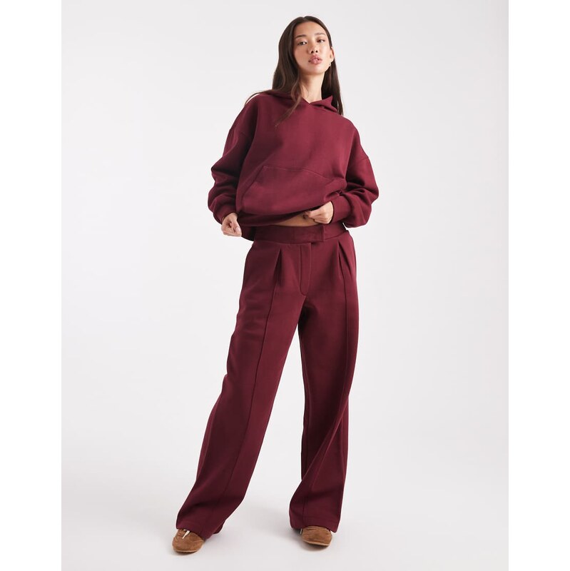 ASOS DESIGN oversized tailored brushback jogger with seam detail in burgundy