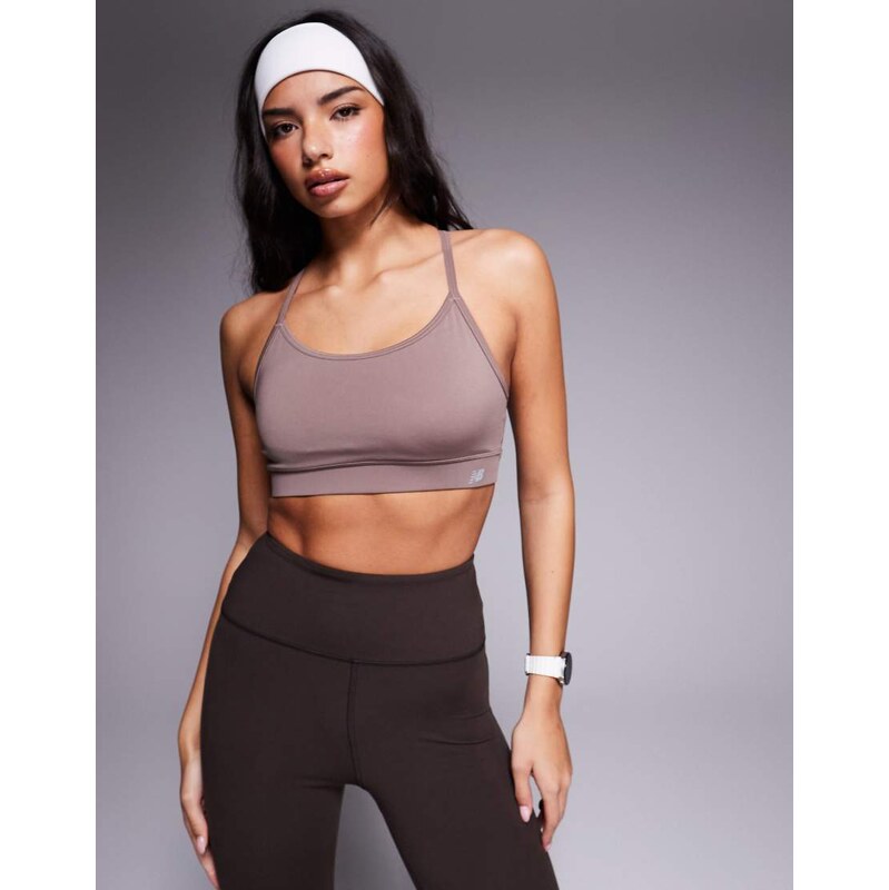New Balance Essential sports bra in brown 108199563