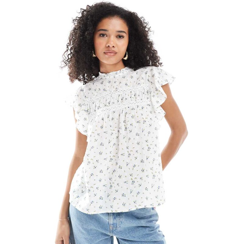 Vero Moda high neck flutter sleeved embroidered top in ditsy floral 115522247