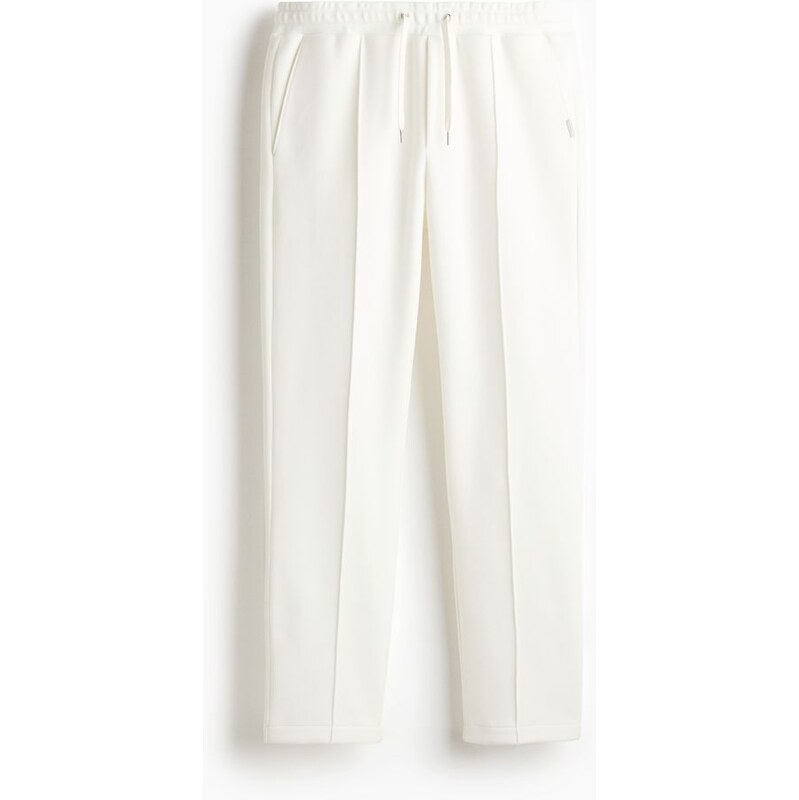 H&M - Elegantní kalhoty jogger Regular Fit - Bílá