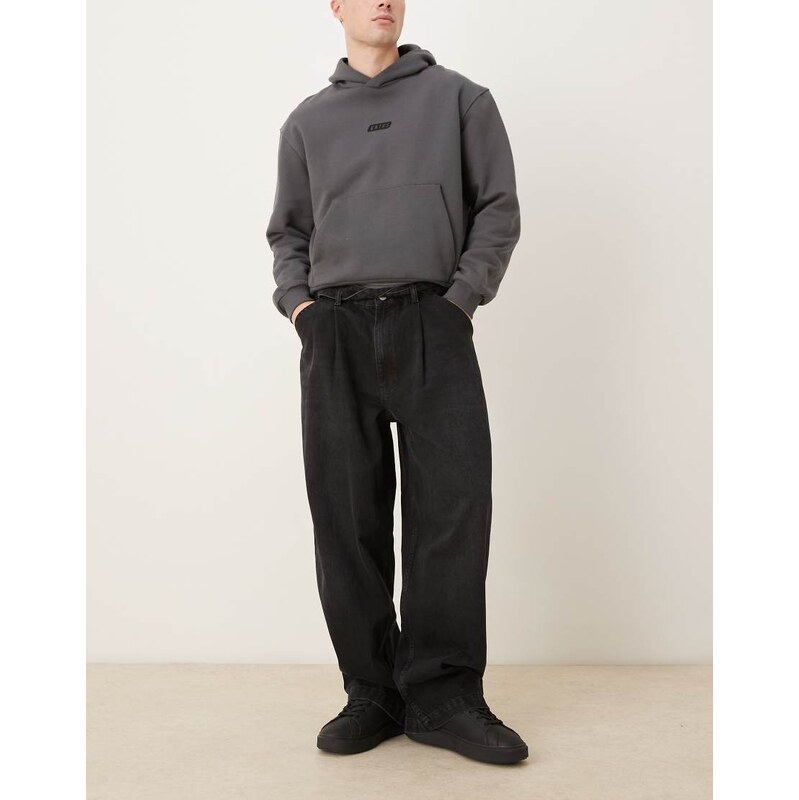 ASOS DESIGN wide leg jeans in black with pleats and belt