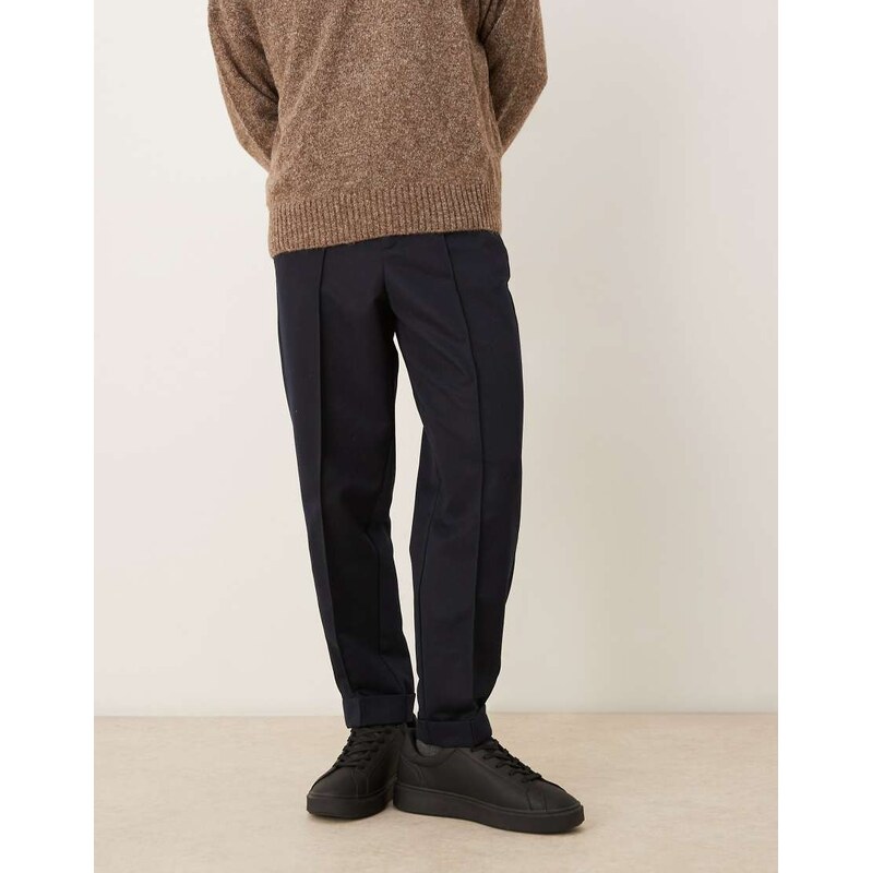 ASOS DESIGN smart carrot fit trousers with turnup hems in navy