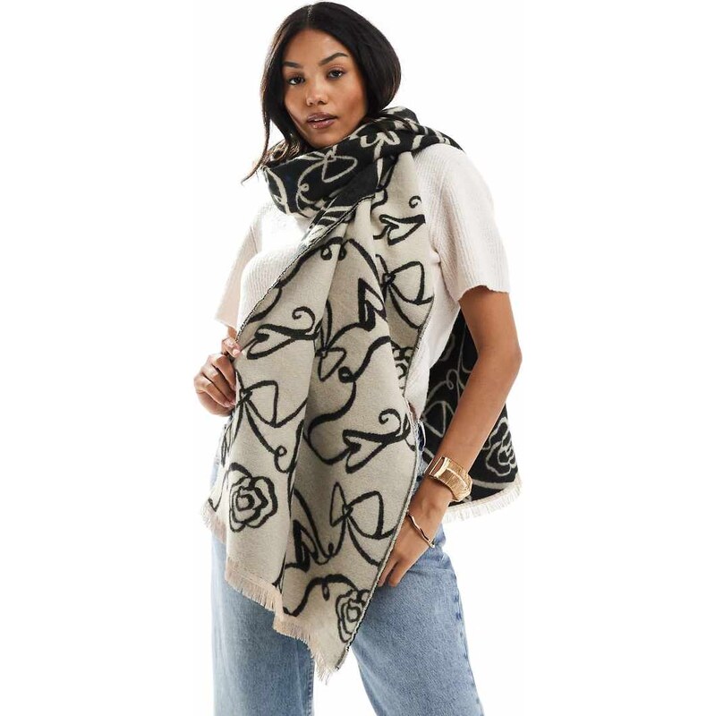 ASOS DESIGN woven scarf in abstract bow and flower jacquard in