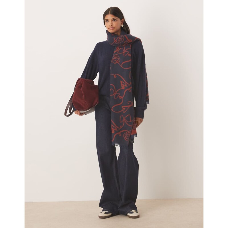 ASOS DESIGN woven scarf in abstract bow and flower jacquard in