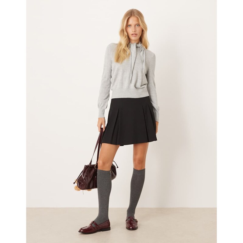 Mango pleated mini skirt in black 108488458