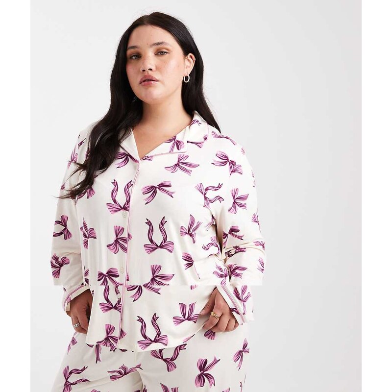 Urban Threads Curve long sleeve revere and trouser pyjama set in bow 108821326