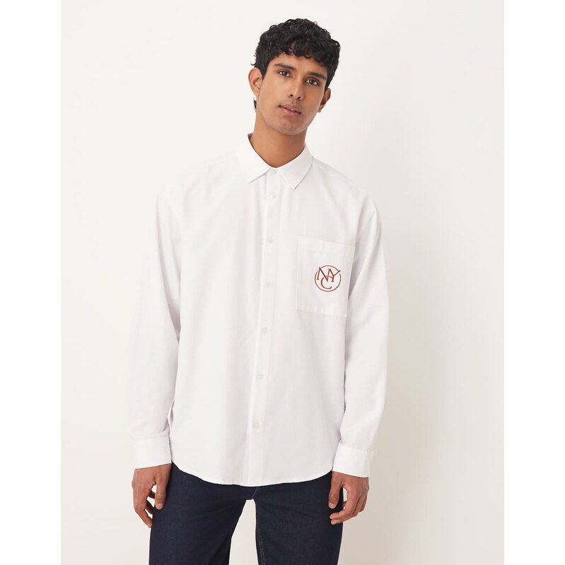 ASOS DESIGN oversized shirt with chest embroidery in white