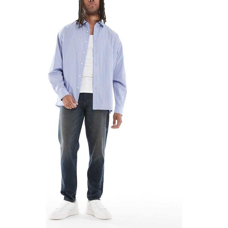 ASOS DESIGN tapered fit jeans in dark wash blue