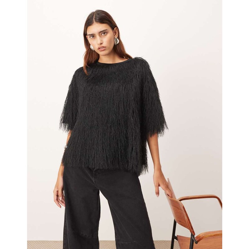 ARRANGE hybrid woven fringe top in black