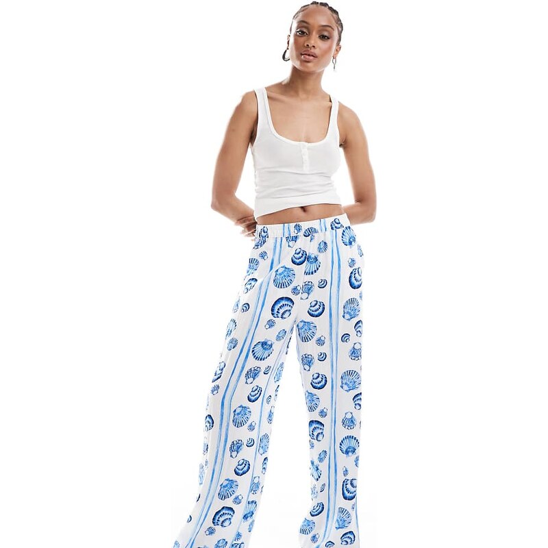 Vero Moda Tall wide leg trousers in blue seashell print