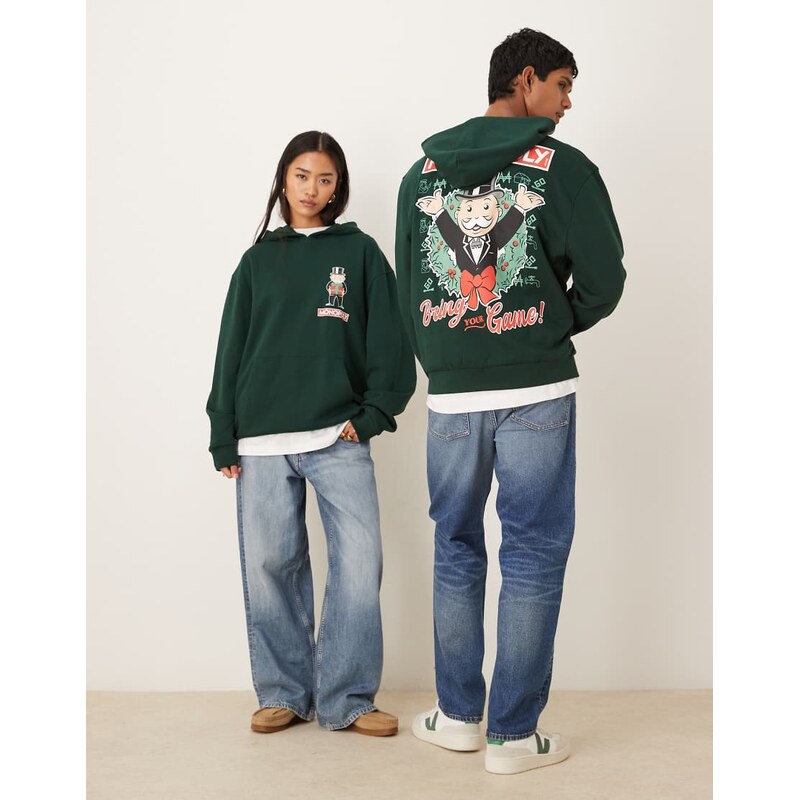 ASOS DESIGN Christams relaxed hoodie with Monopoly prints in green