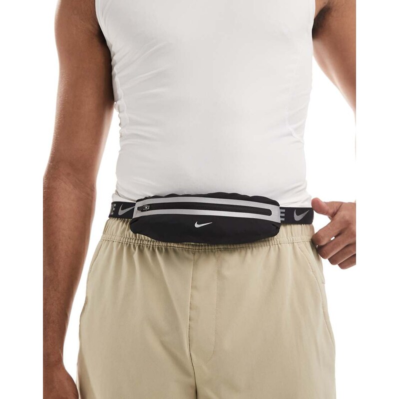 Nike Running Nike slim waistpack in black and silver