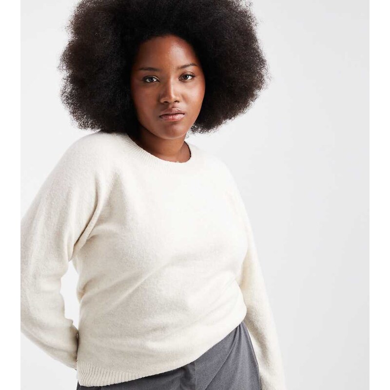 Vero Moda Curve soft round neck knitted jumper in cream-Black