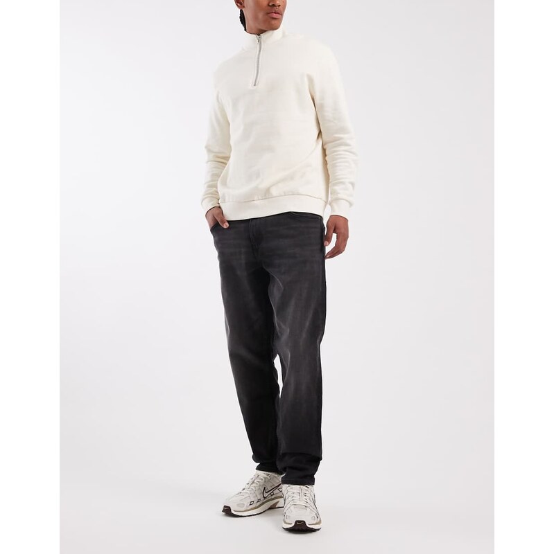 ASOS DESIGN tapered jeans in black wash with stretch