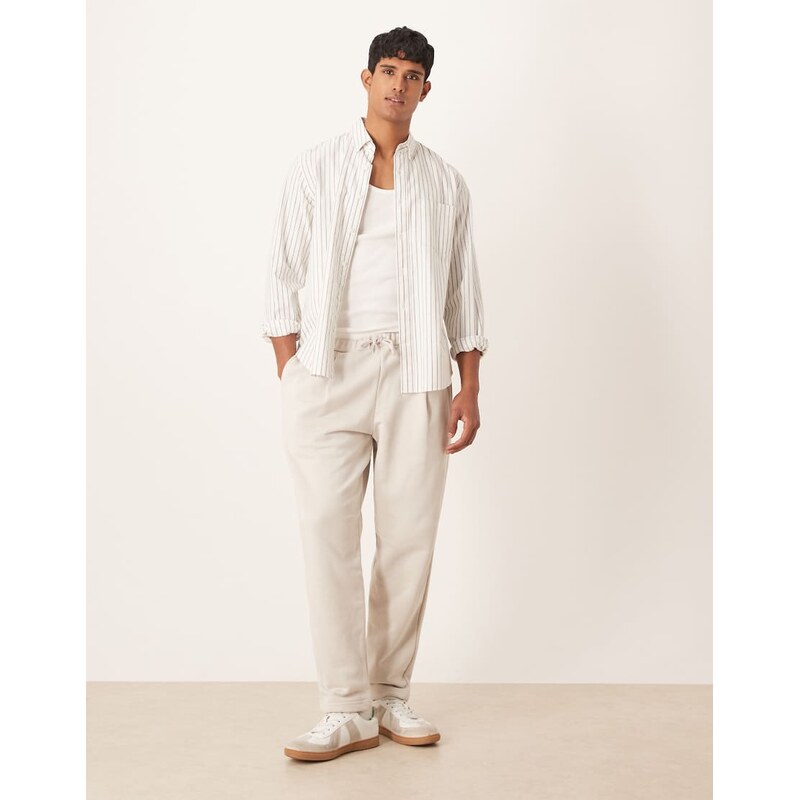 ASOS DESIGN relaxed tapered joggers with pleats in stone-Neutral