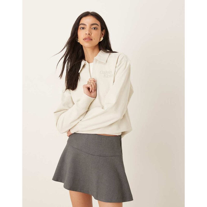Calvin Klein Jeans long sleeve 1/4 zip logo polo top in ecru-White 108969580