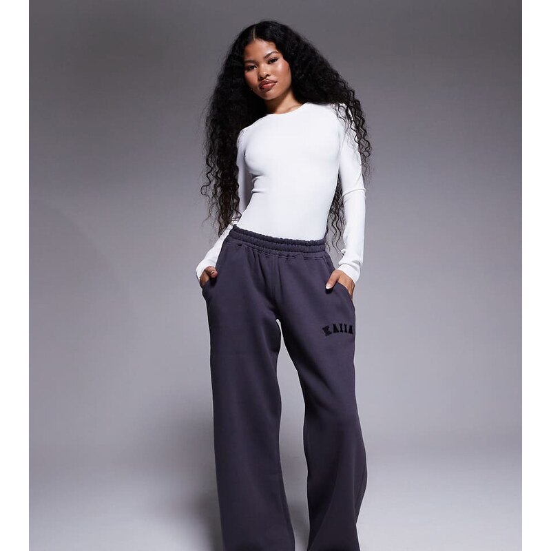 Kaiia Petite cotton blend embroidered logo wide leg joggers in