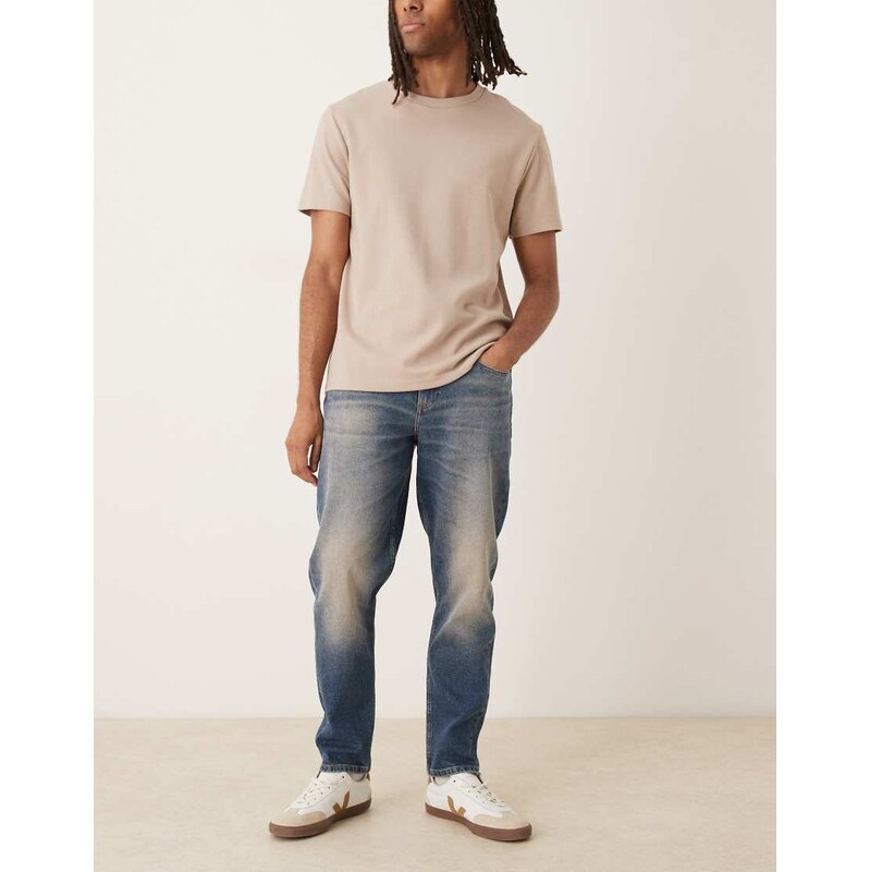 ASOS DESIGN stretch tapered jeans in dark wash blue
