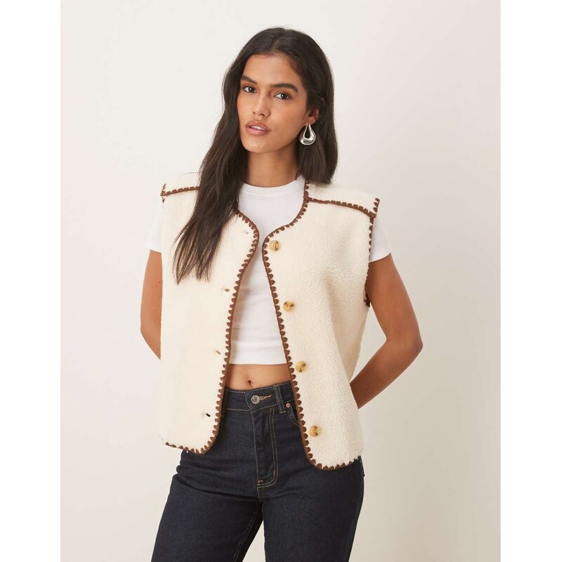 ASOS DESIGN borg fleece gilet with blanket stitch in cream and