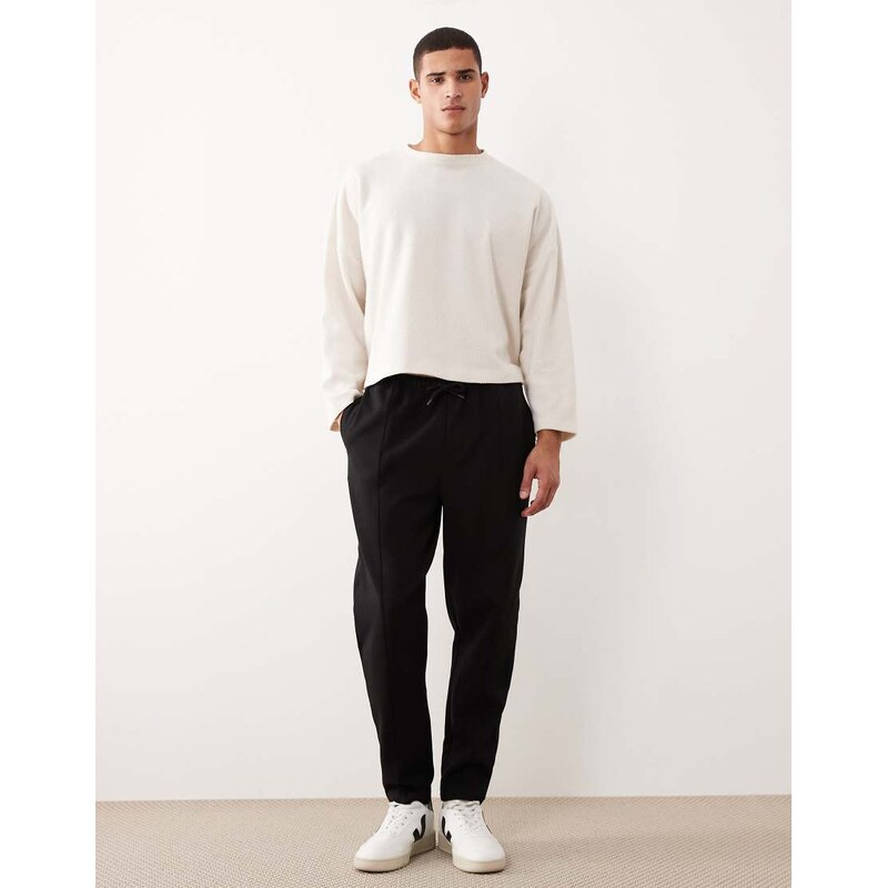 ASOS DESIGN tapered jogger with pin tuck in black