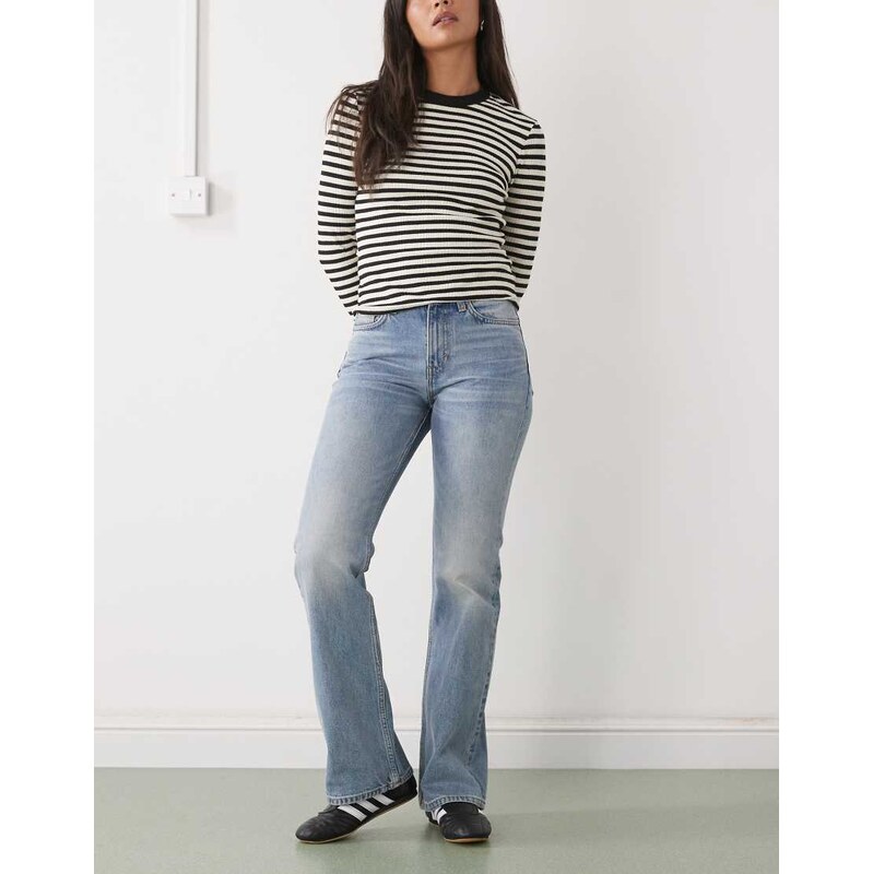 Weekday Moon mid waist bootcut flare jeans in stonewash blue 112321259