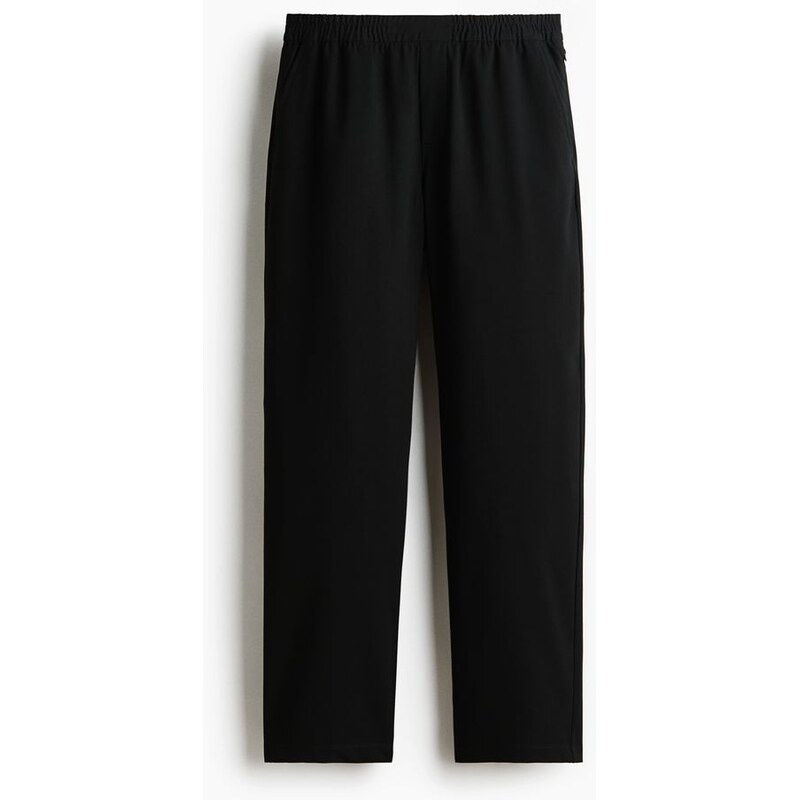 H&M - Natahovací kalhoty Four-way Stretch Regular Fit - Černá
