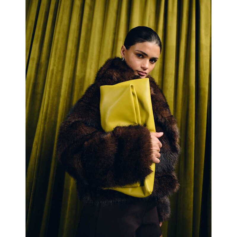 ASOS DESIGN elongated clutch bag in chartreuse-Yellow