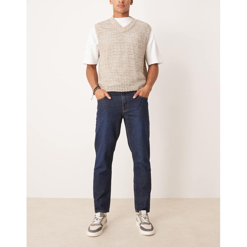 ASOS DESIGN tapered jeans in dark wash blue