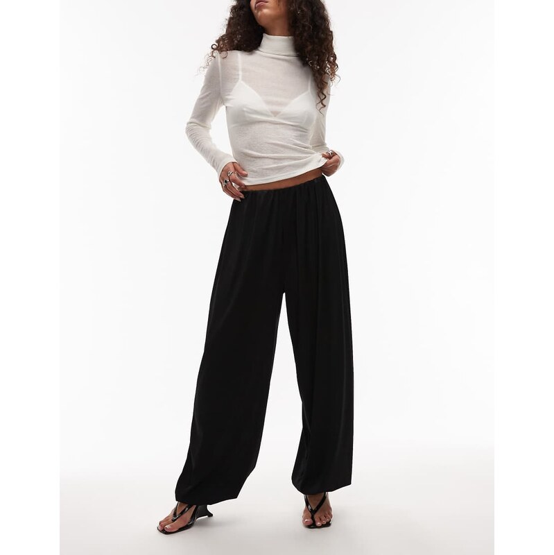 ASOS DESIGN satin twill balloon trouser in black 109353946