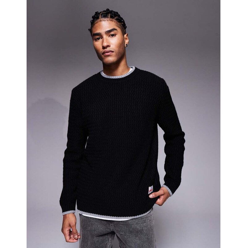 ASOS DESIGN oversized knitted textured jumper with woven label in black