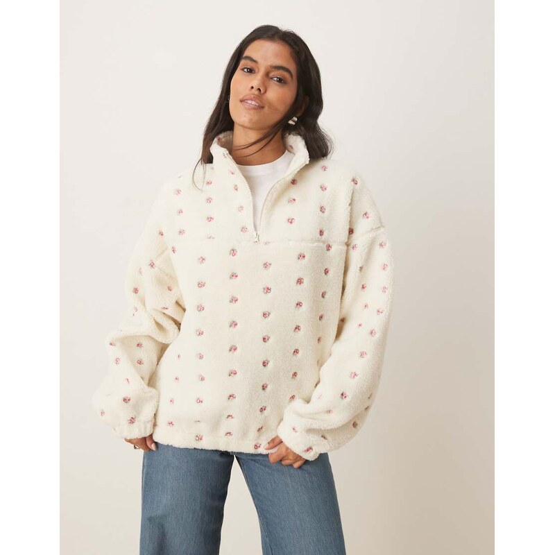 ASOS DESIGN borg zip through fleece with embroidered flower detail in 109436402
