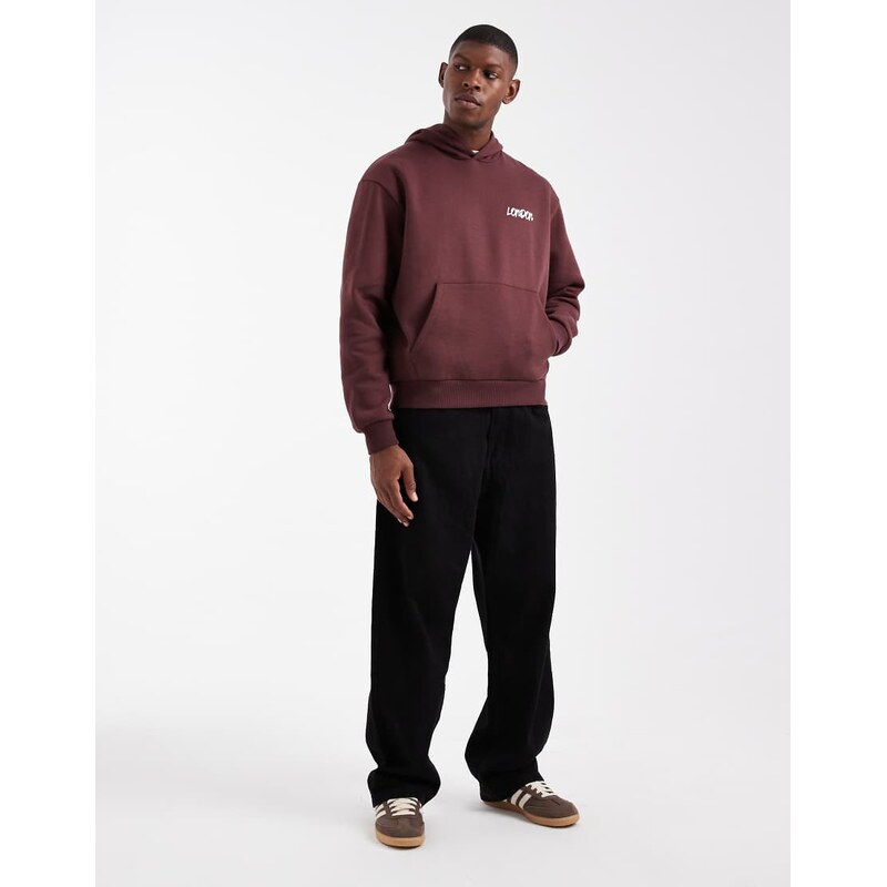 ASOS DESIGN relaxed boxy hoodie with graffiti print in brown