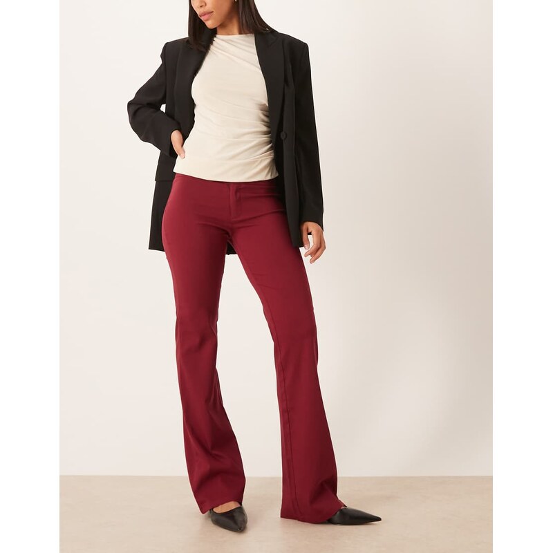 Motel falita low rise flared trouser in burgundy