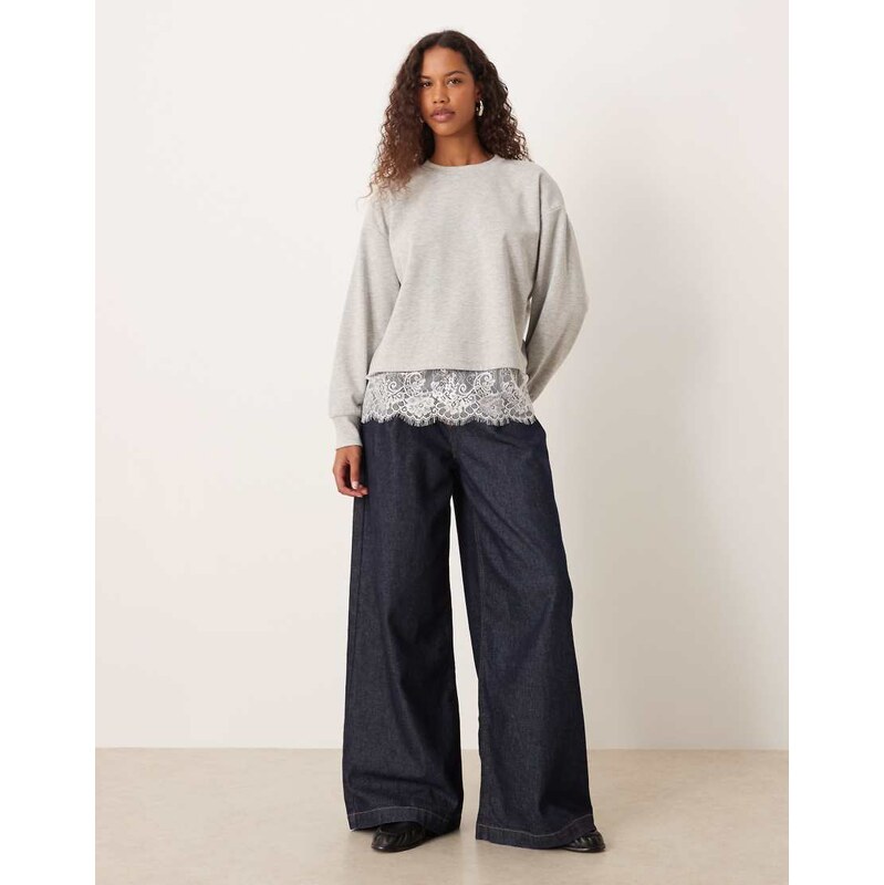 ASOS DESIGN oversized sweatshirt with lace hem underlayer detail in 109464770