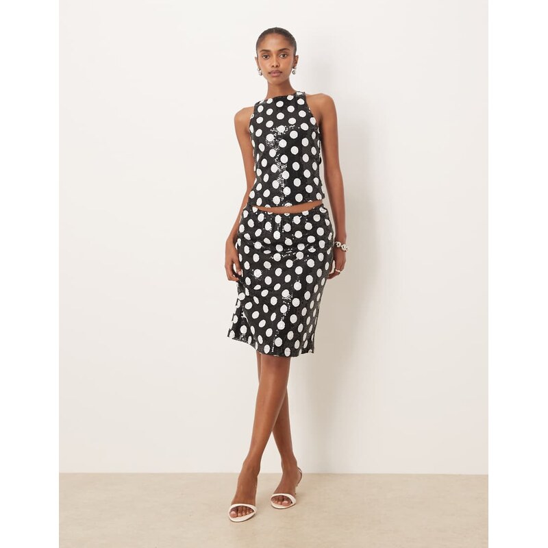 Motel kavivi low rise knee length skirt in mono polka dot sequin