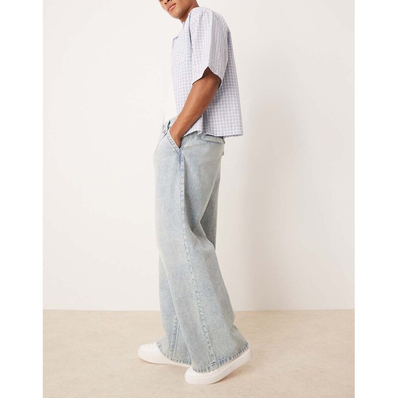 ASOS DESIGN loose jeans with front pleats in light wash blue