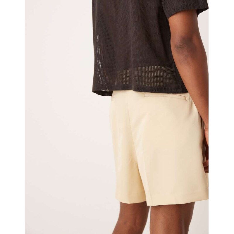 ASOS DESIGN smart bermuda cropped shorts with front pleat in buttermilk-Yellow