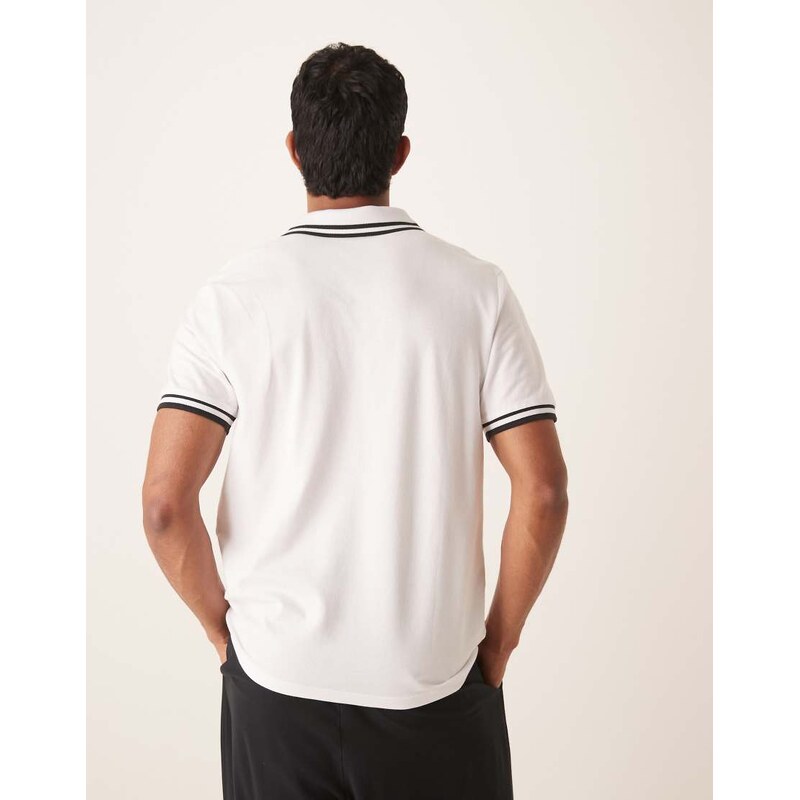 ASOS DESIGN Essentials Polo with black tipping in white pique