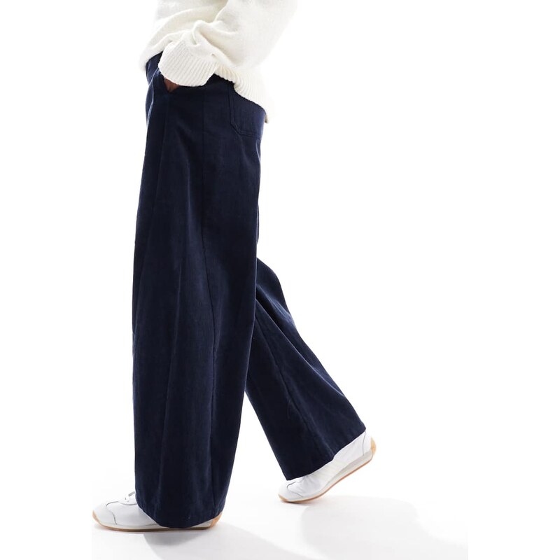 ASOS DESIGN baby cord extreme horseshoe trousers with seam detail in navy-Yellow
