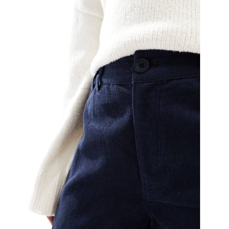 ASOS DESIGN baby cord extreme horseshoe trousers with seam detail in navy-Yellow