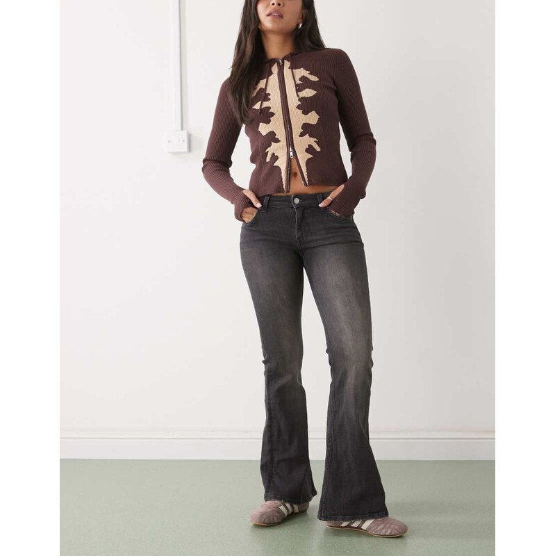 Weekday Katsumi low waist flared jeans in faded black 110611427