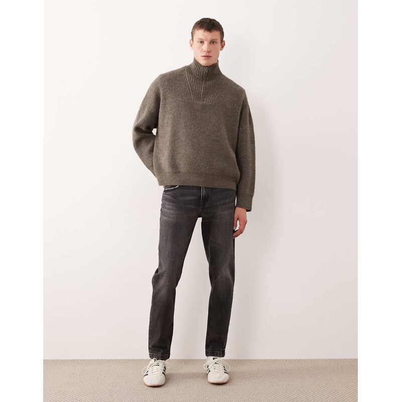 ASOS DESIGN tapered jeans in washed black