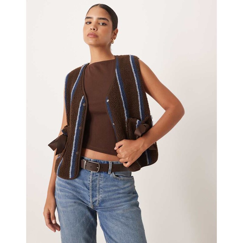 ASOS DESIGN borg fleece gilet in with bow pocket detail in blue