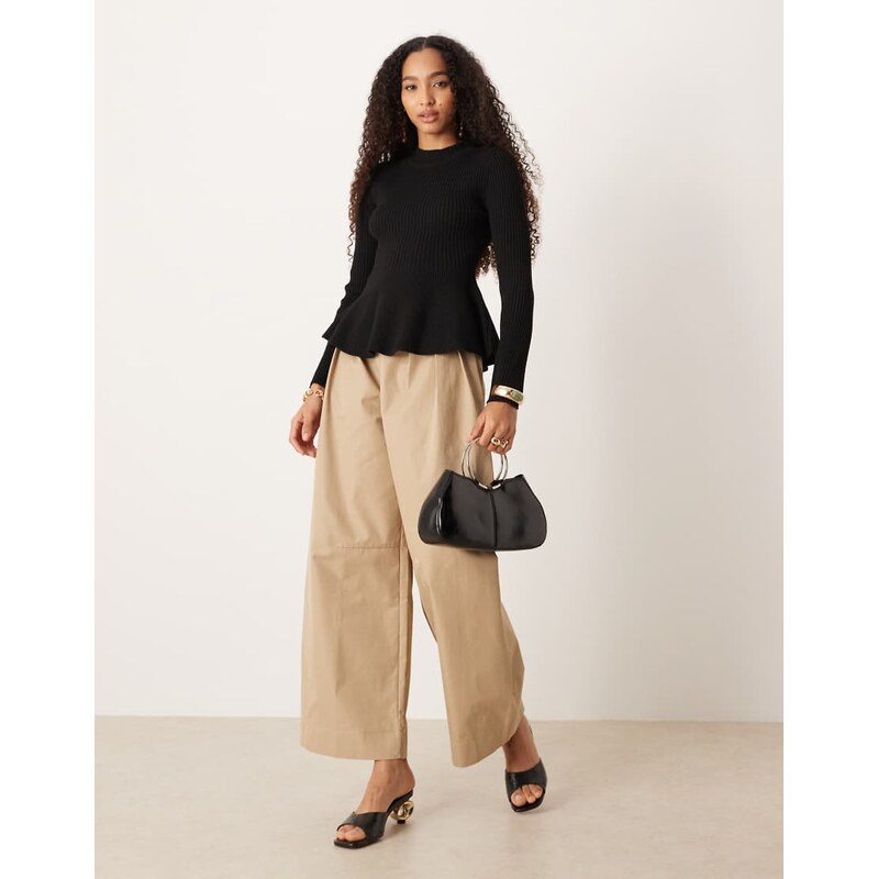 Mango ribbed knitted top with peplum hem in black 109594235