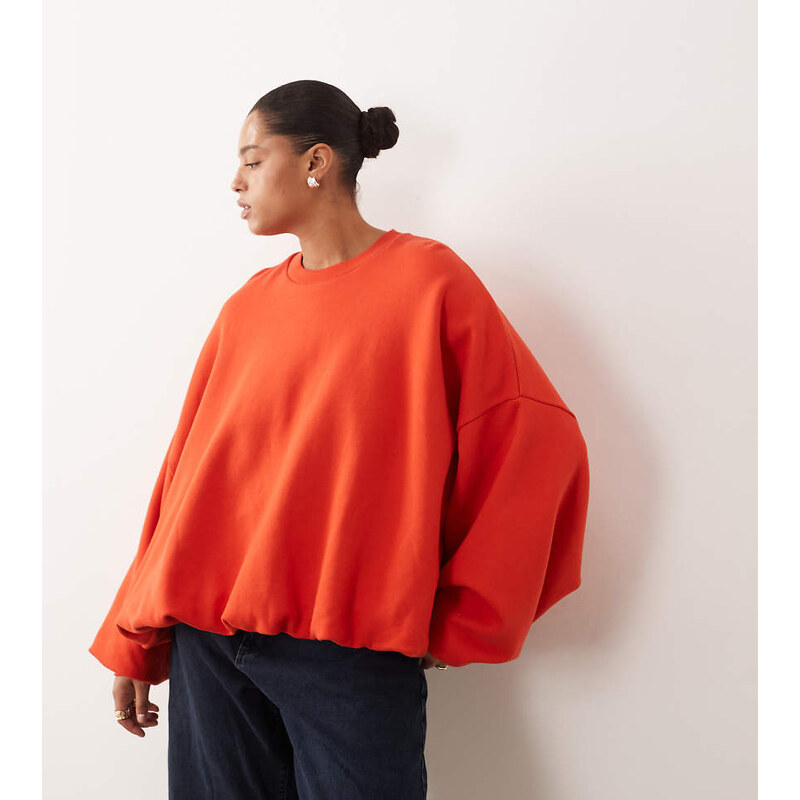 ARRANGE Curve bubble hem sweatshirt in red 110980189