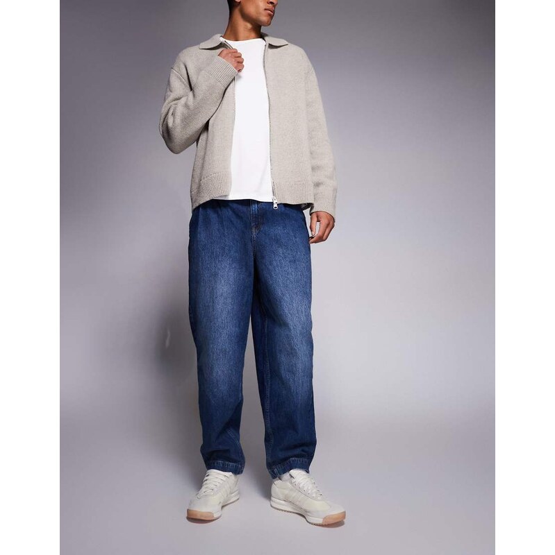 ASOS DESIGN oversized tapered fit jeans with pleat detail in