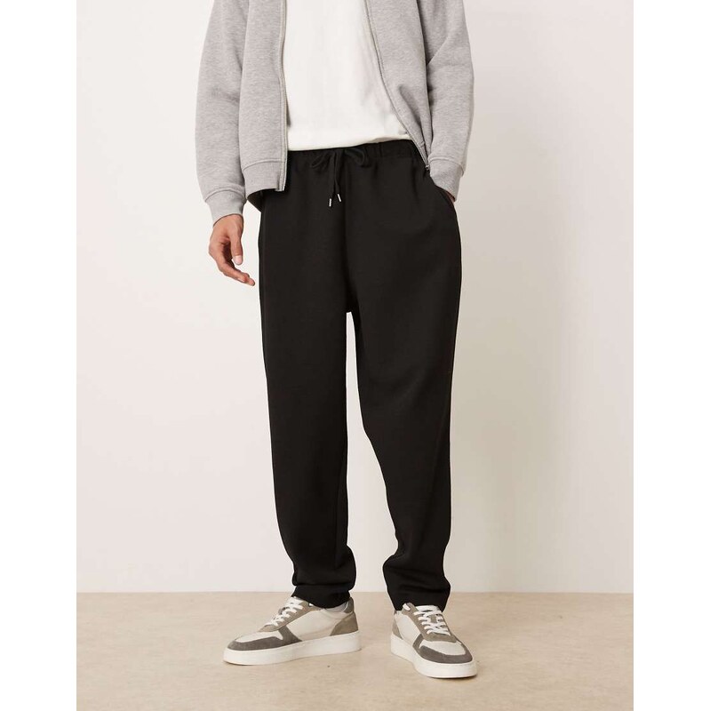 ASOS DESIGN tapered jogger with front pleats in black
